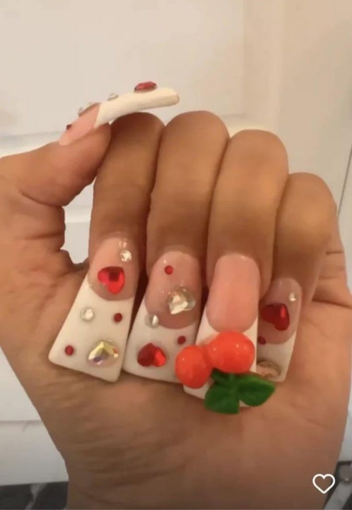 Duck feet nails as seen on Cardi B 