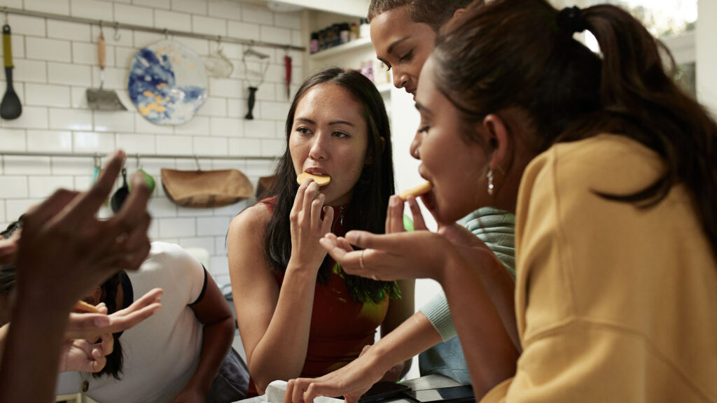 Housemates in kitchen