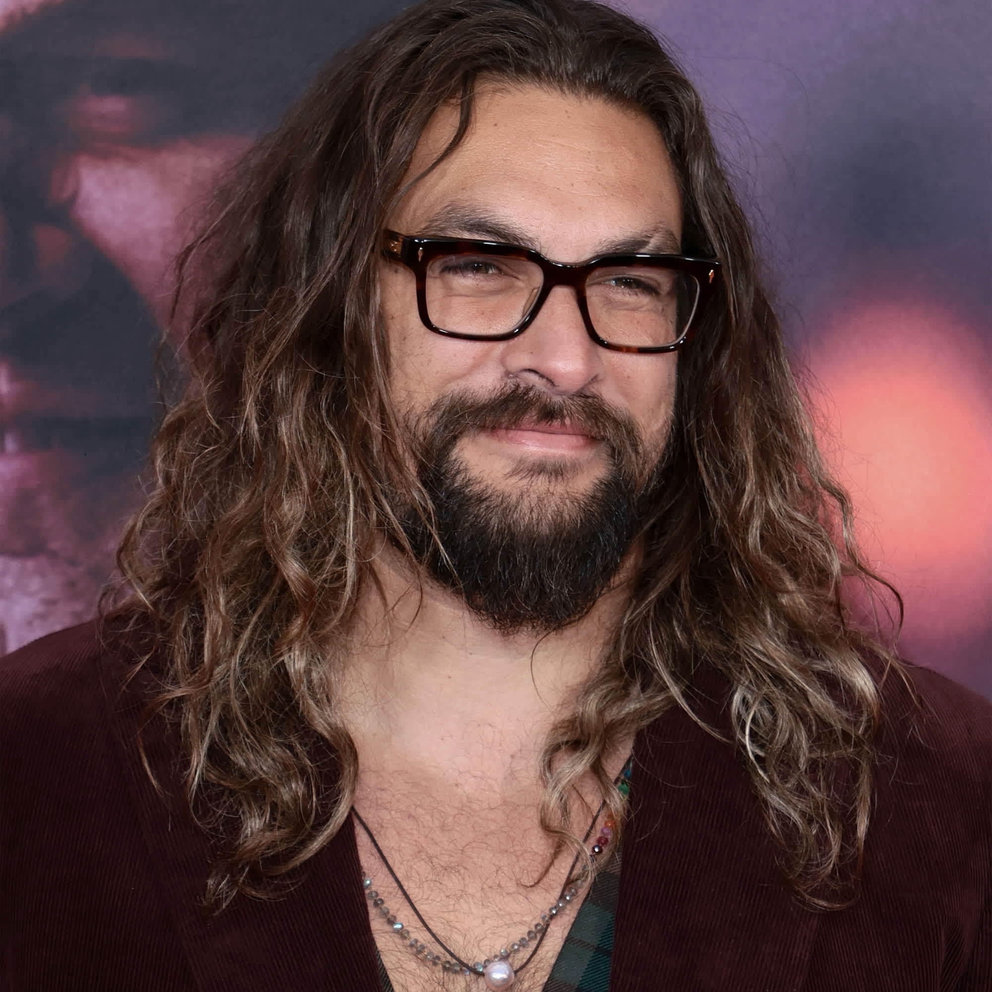 A headshot of Jason Momoa at 