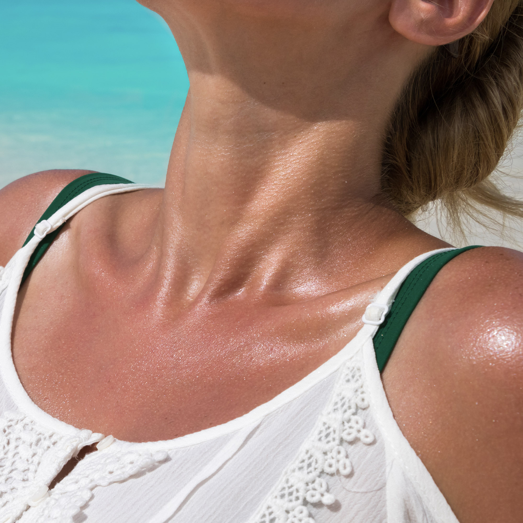 Woman Sunbathing Leaning Back